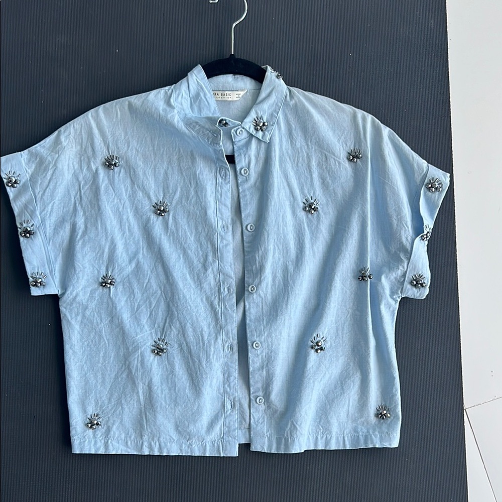 Zara Light Blue Embellished Button-Up Shirt. Fit is more of a crop top. Size S